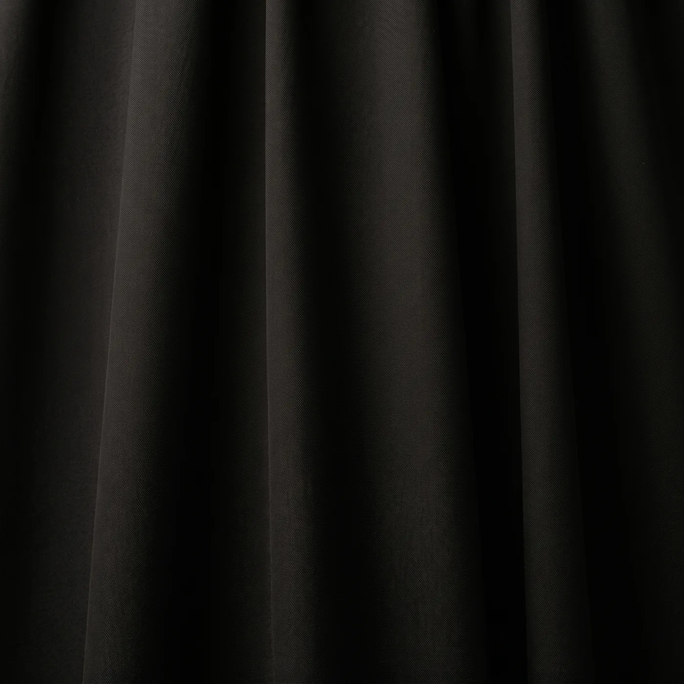 Close detail of matte black crepe, showing its grain